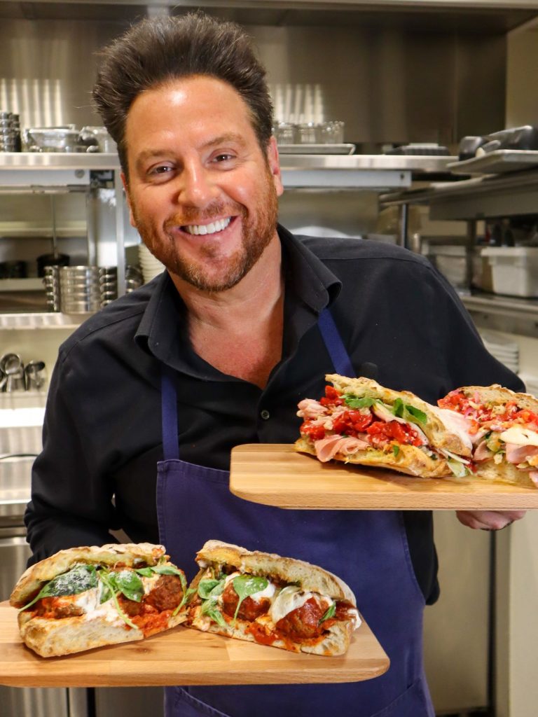 Scott Conant and two of his sandiwches from The Kitchen